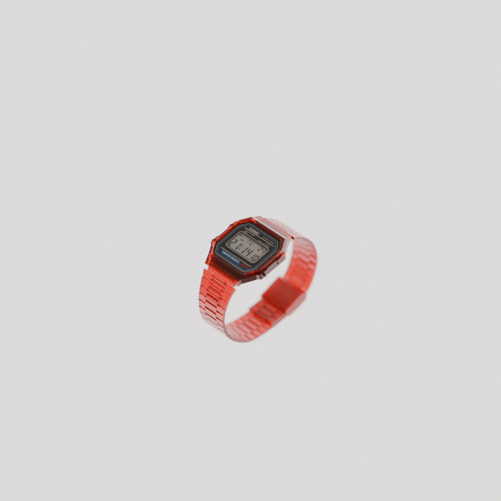 A small translucent red CASIO A168 floating in a pale field